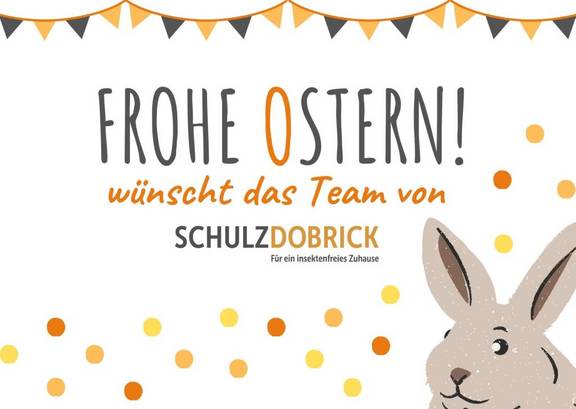 Osterkarte der Schulz-Dobrick GmbH 2020 mit Text Frohe Ostern wuenscht das Team der Schulz-Dobrick GmbH mit Hasen rechts unten in der Ecke und gelb-orangen Punkten